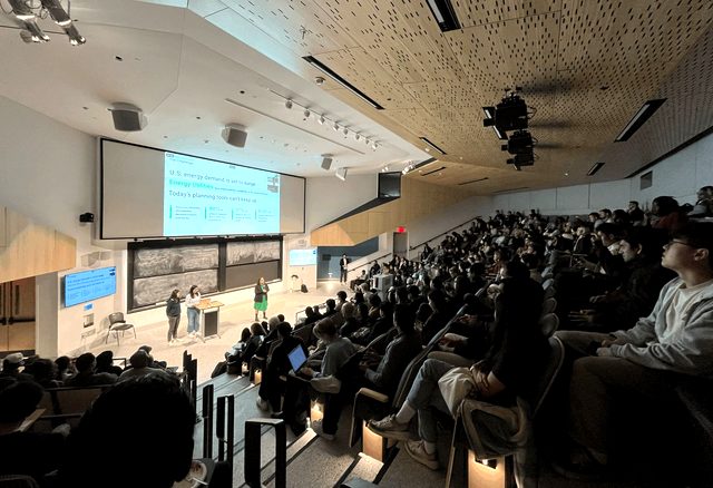 A packed MIT auditorium during a startup demo day